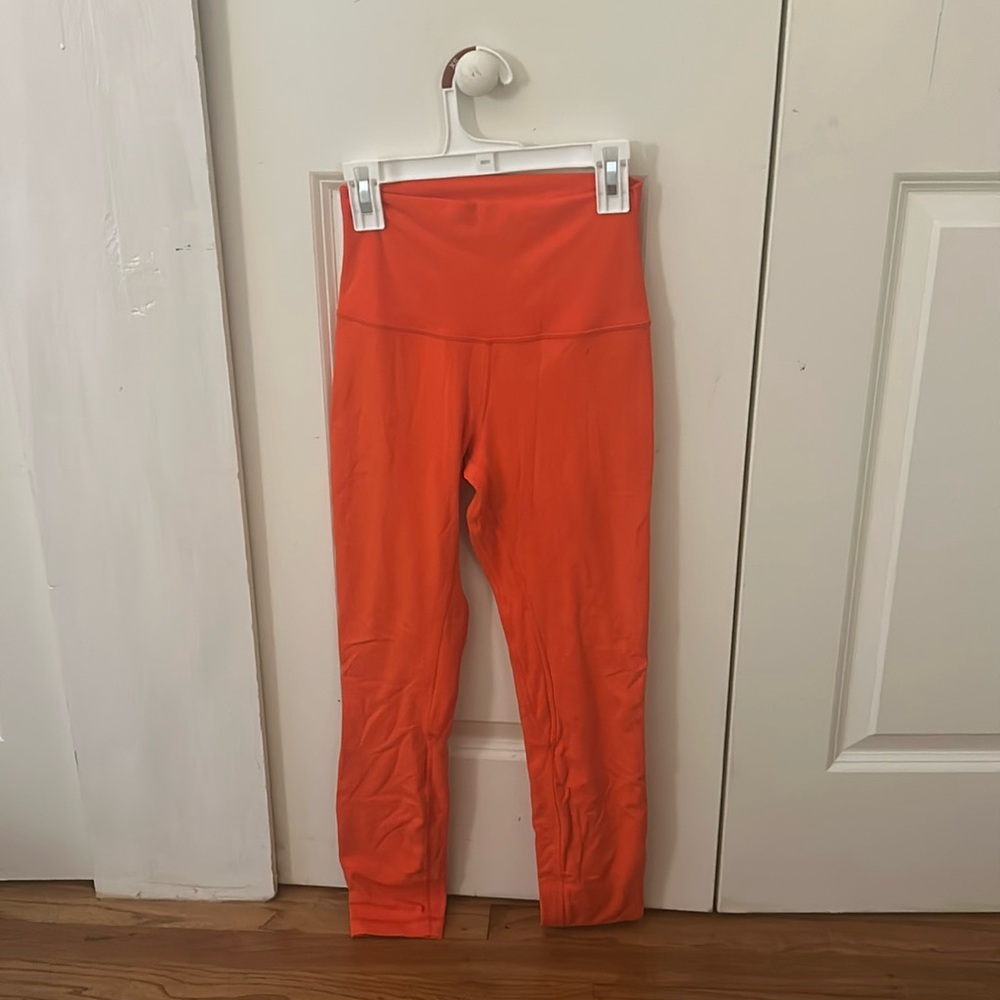 Orange women’s lululemon high rise leggings